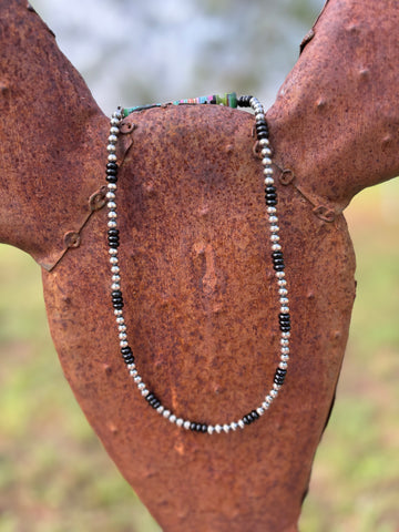 Navajos with Onyx Beads